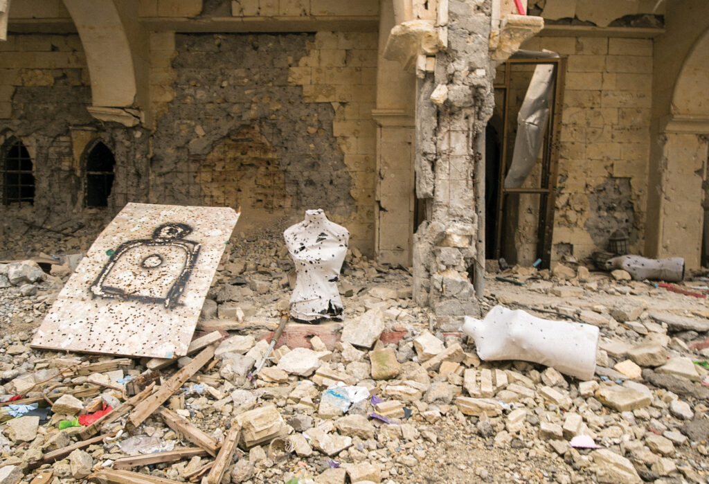 A building filled with rubble and gun targets